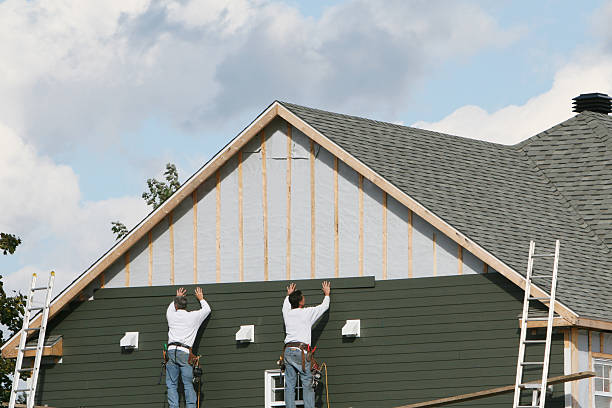 Professional Siding Installation technician working in Milroy, PA
